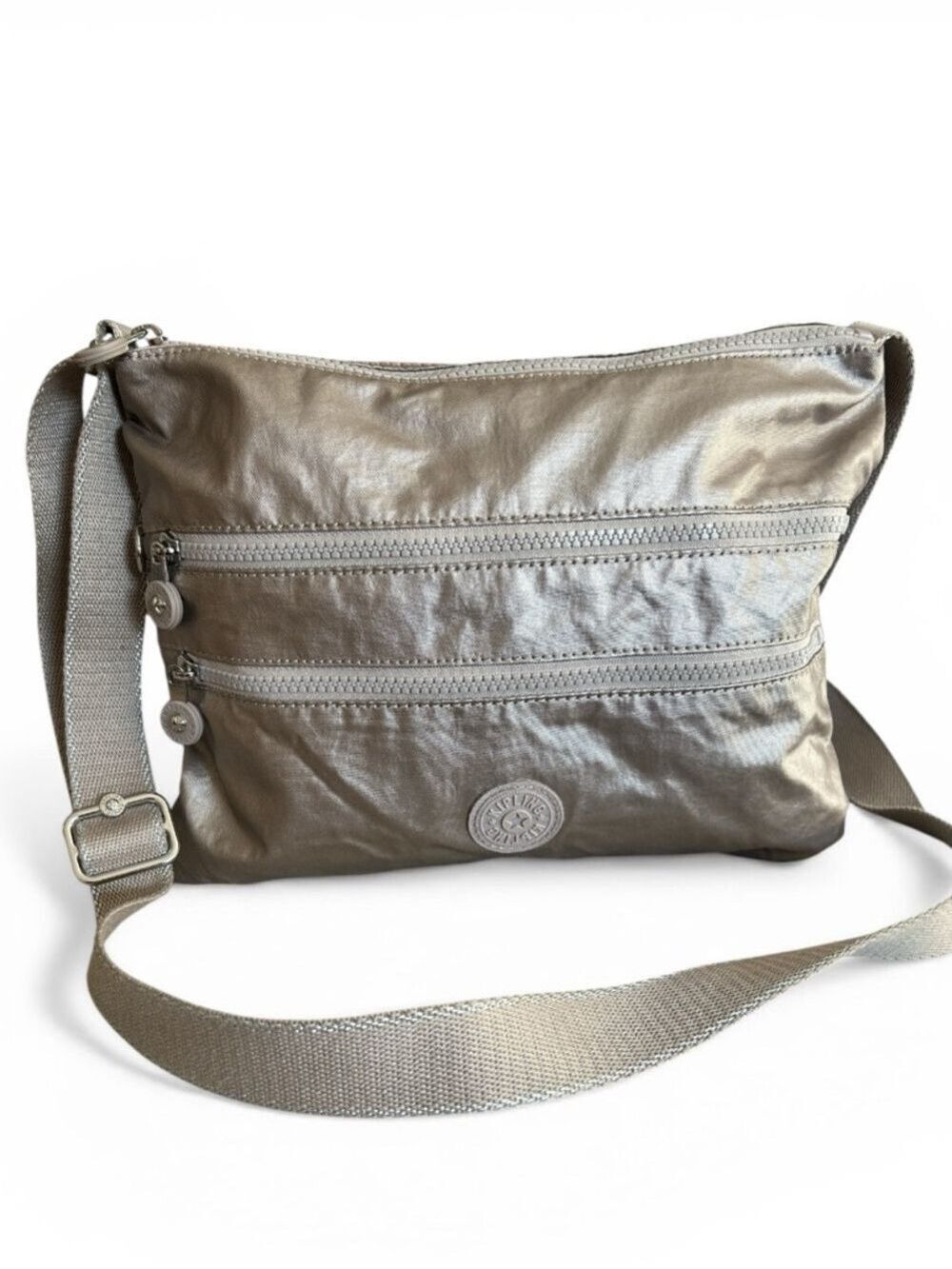Kipling Alvar Double
Zipper Messenger Crossbody in Metallic Glow